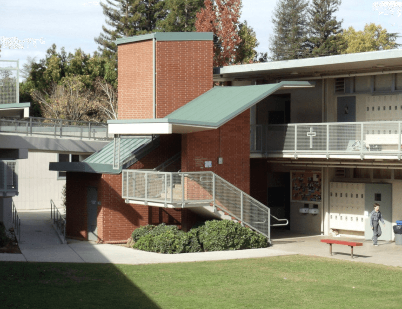 Brick classroom building and breezeway on the Jesuit High School campus.
